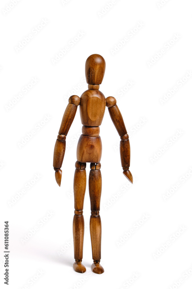 Standing wooden mannequin white background.