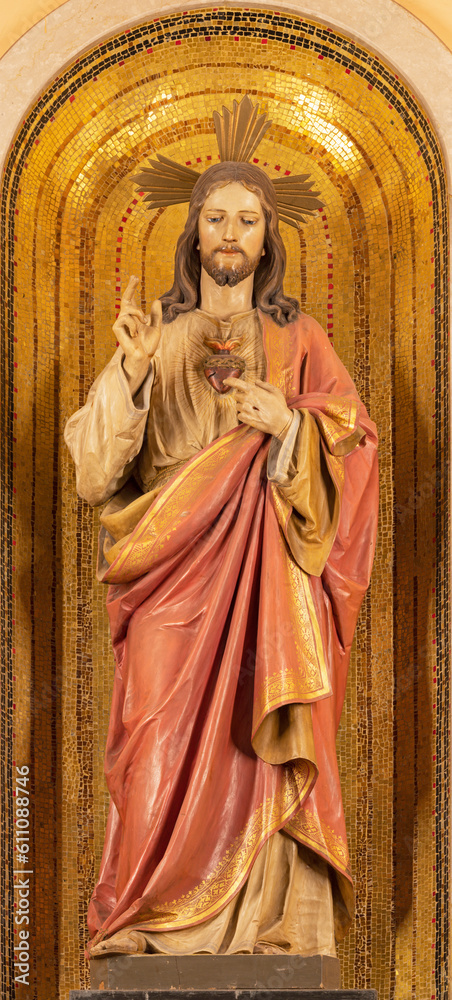 IVREA, ITALY - JULY 15, 2022: The carved polychrome statu of Heart of Jesus in the church Santuario Monte Stella.