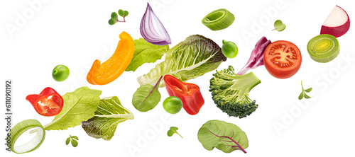 Falling vegetables, salad of bell pepper, tomato and lettuce leaves