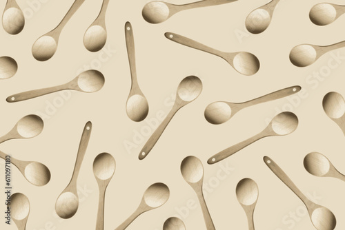 Wooden kitchen spoons scattered randomly on a brown background. Concept of cooking and food preparation	