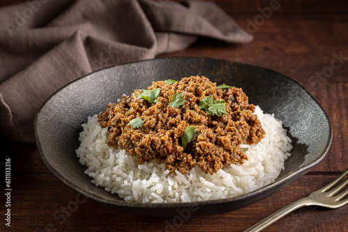 Rice with minced meat on the plate.