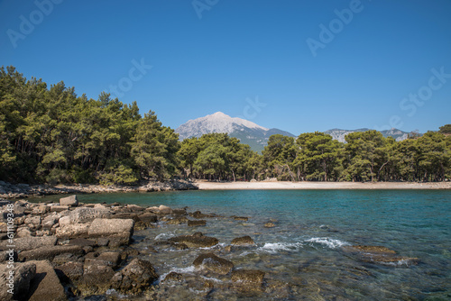 Mount Olympos Tahtali above the sea lagoon of the Mediterranean Sea. photo