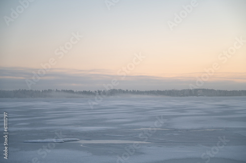 Wide angle shot of a wintery sunset by the seaside