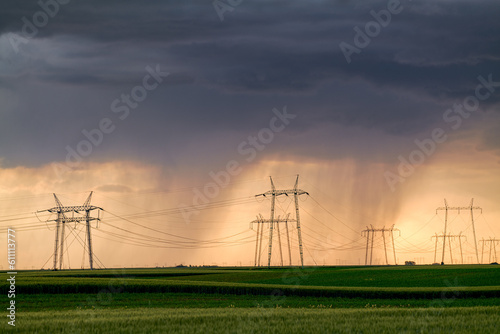 Rain shafts over powerlines