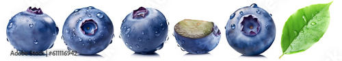 Set of blueberries with bloom in drops: whole berries, one cut and blueberry leaf isolated on a white background.