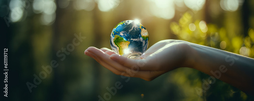 Captivating image of a man's hand holding a mini Earth globe, with continents shaped by stunning natural elements like forests, deserts, and oceans. Emotionally charged & unique! Generative AI