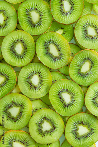 macro kiwi background,Kiwi Macro,Fresh Kiwi fruit sliced use for background,slice of kiwi fruit on a full frame. horizontal format