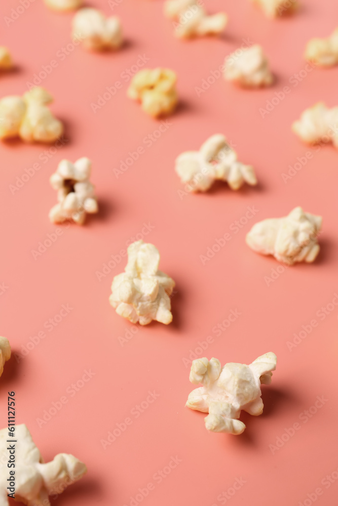 Crispy popcorn on pink background