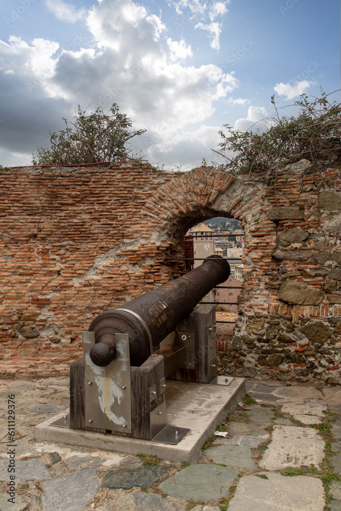 Ancient cannon restored and relocated in the Priamar Fortress (1542) pointed towards the city instead of the sea because it was in defense of attacks from Piedmont, Savona, Liguria, Italy