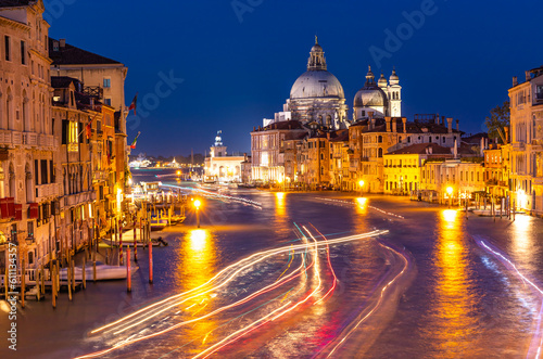 Basilica of Santa Maria della Salute on the Grand Canal in Venice at night, Italy