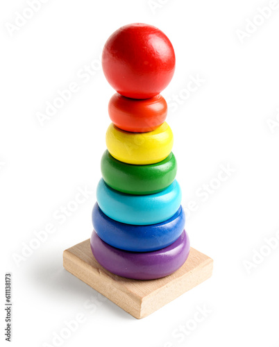Wooden colorful toy pyramid isolated on white background. Children's Day celebration