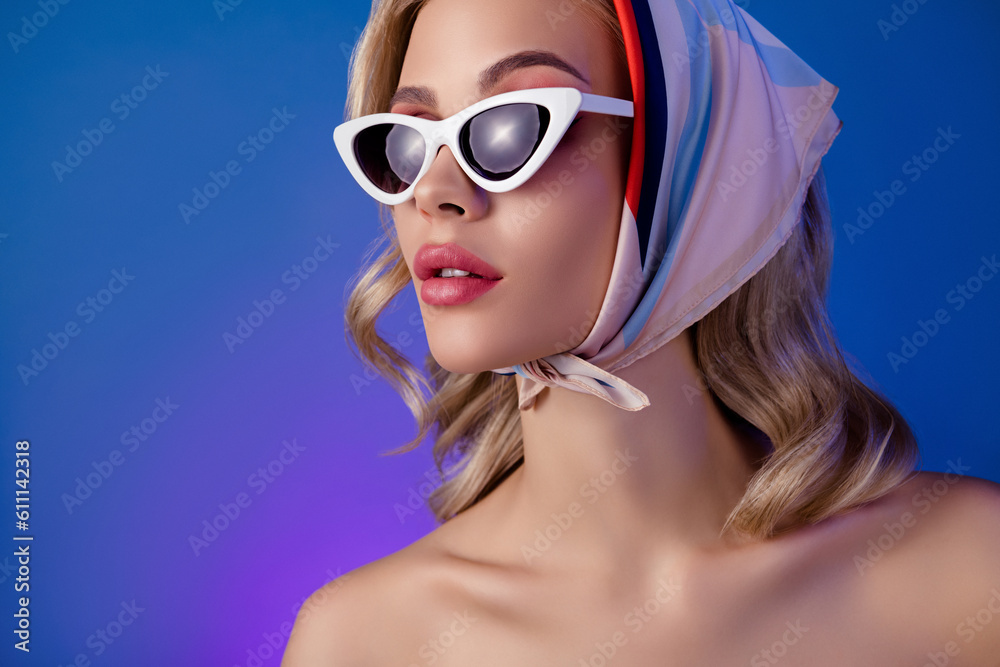Close up photo of classy pretty lady rest summer tour fashion week wear fashionable head scarf over blue background Close up photo of classy pretty lady rest summer tour fashion week wear fashionable head scarf over blue background