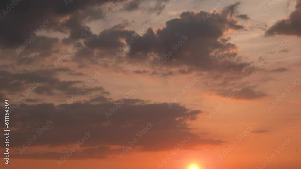 Purple orange sunset sky, red orange video 4k cloud. Beautiful evening clouds background