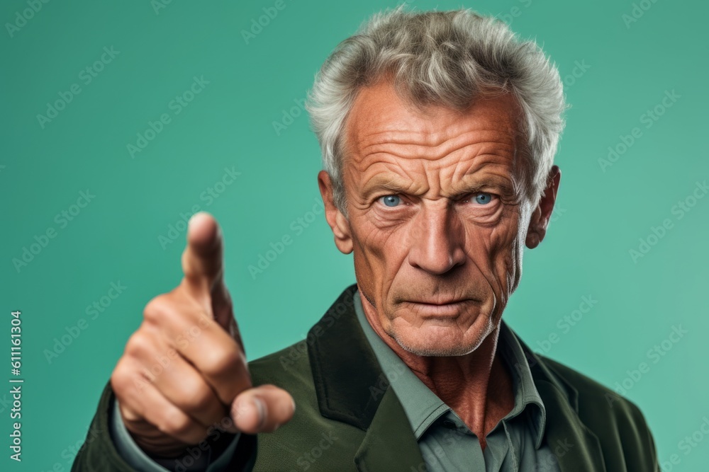 Headshot portrait photography of a tender mature man pointing at oneself against a mint green background. With generative AI technology