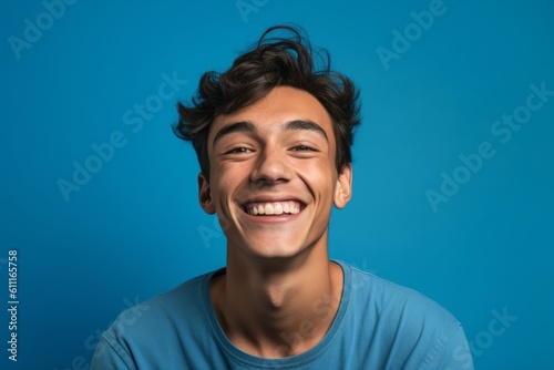 Medium shot portrait photography of a satisfied boy in his 20s giving a hug to the camera against a periwinkle blue background. With generative AI technology