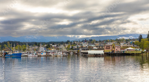 The harbour of Port Alberni, B.C., is seen from a boat on the Alberni Inlet. The waterfront features shops, galleries and eateries. © Colin N. Perkel