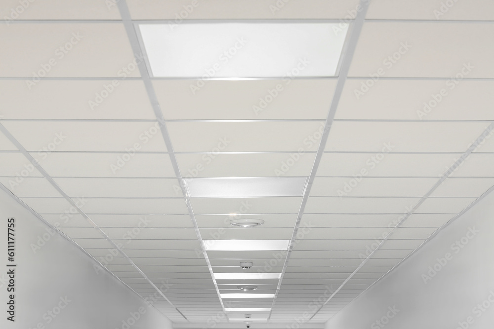 White ceiling with modern lighting in room White ceiling with modern lighting in room