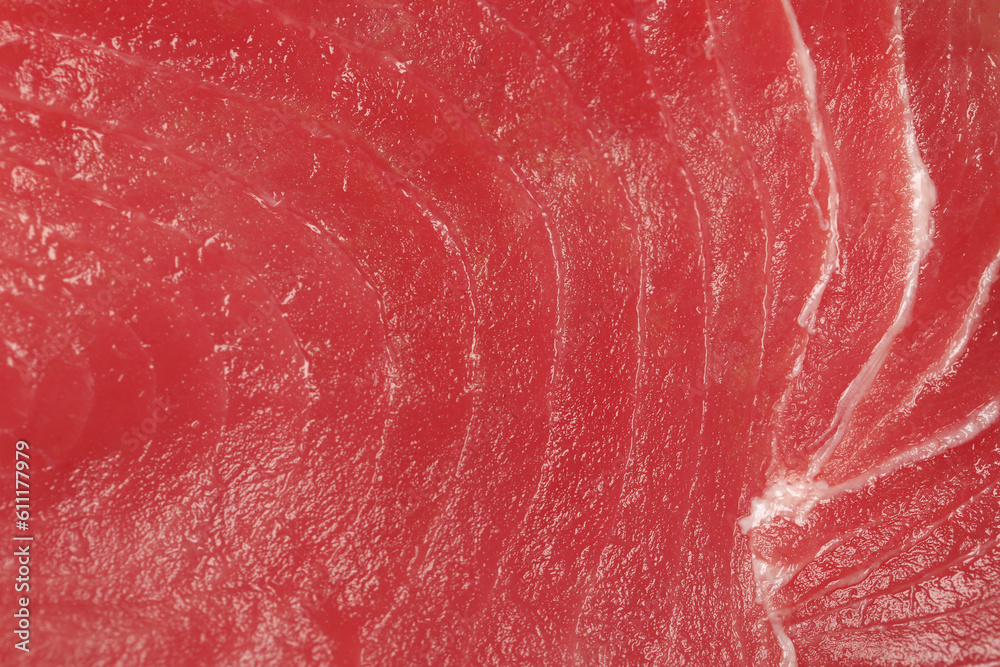 Fresh raw tuna fillet as background, top view