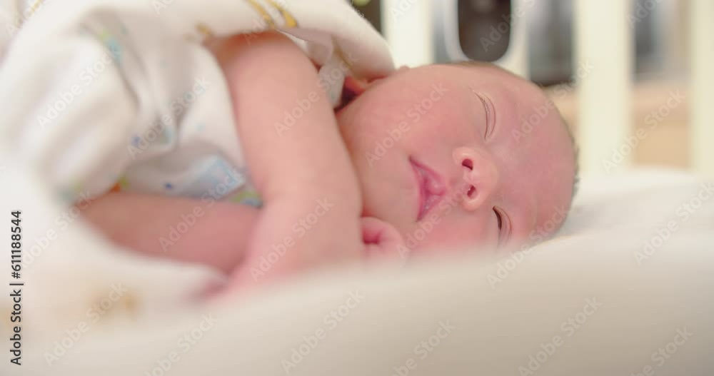 close up portrait face of cute lovely little newborn baby infant sleeping at home, Happiness Newborn Baby at Comfortable Home in Day Lighting Indoors close up portrait face of cute lovely little newborn baby infant sleeping at home, Happiness Newborn Baby at Comfortable Home in Day Lighting Indoors