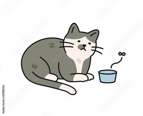 Cute cat. A dirty and hungry stray cat sits sadly in front of an empty feed bowl.