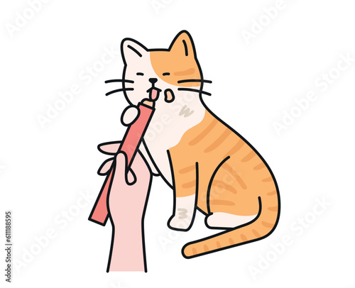 Cute cat. A dirty stray cat enjoys a treat from a human being.
