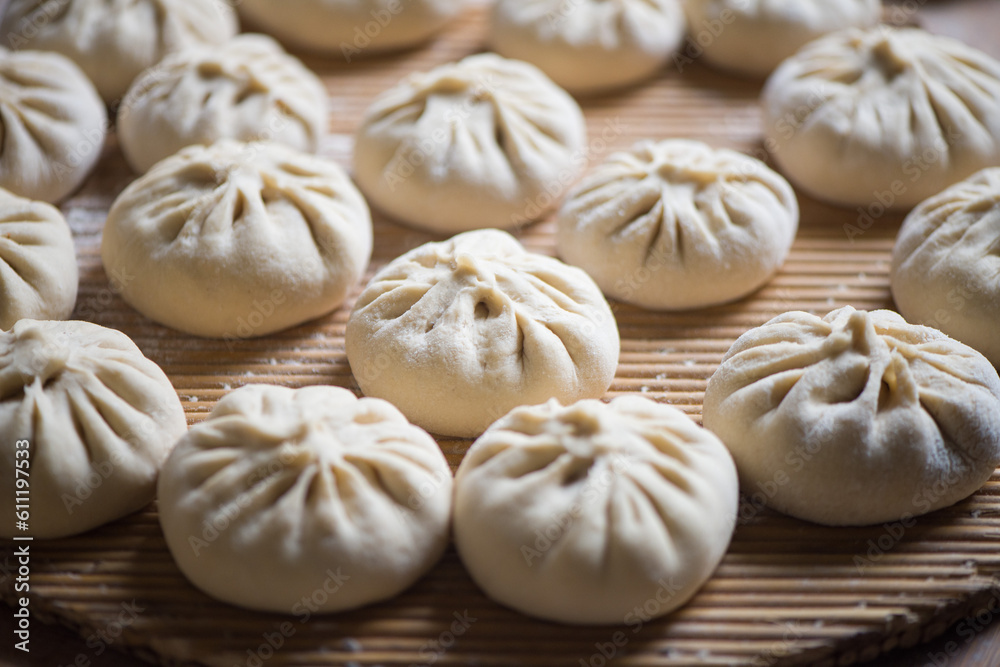 Homemade raw steamed buns. Delicious baozi, Homemade raw steamed buns. Delicious baozi,