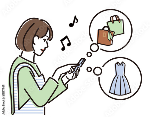 スマホでネットショッピングするエプロン姿の女性