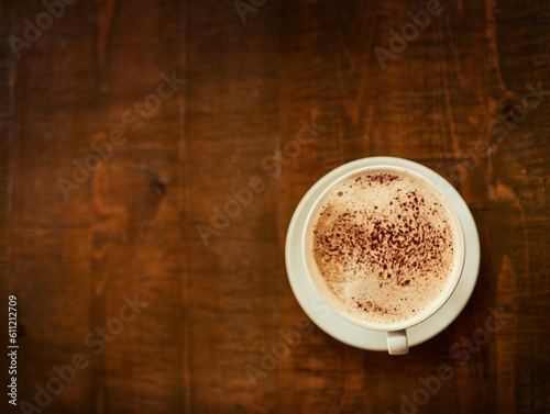 Top view wooden table, coffee cup or mock up restaurant, cafe or retail diner for beverage service, wellness drinks or espresso. Fresh caffeine aroma, warm latte and desk with morning hot chocolate