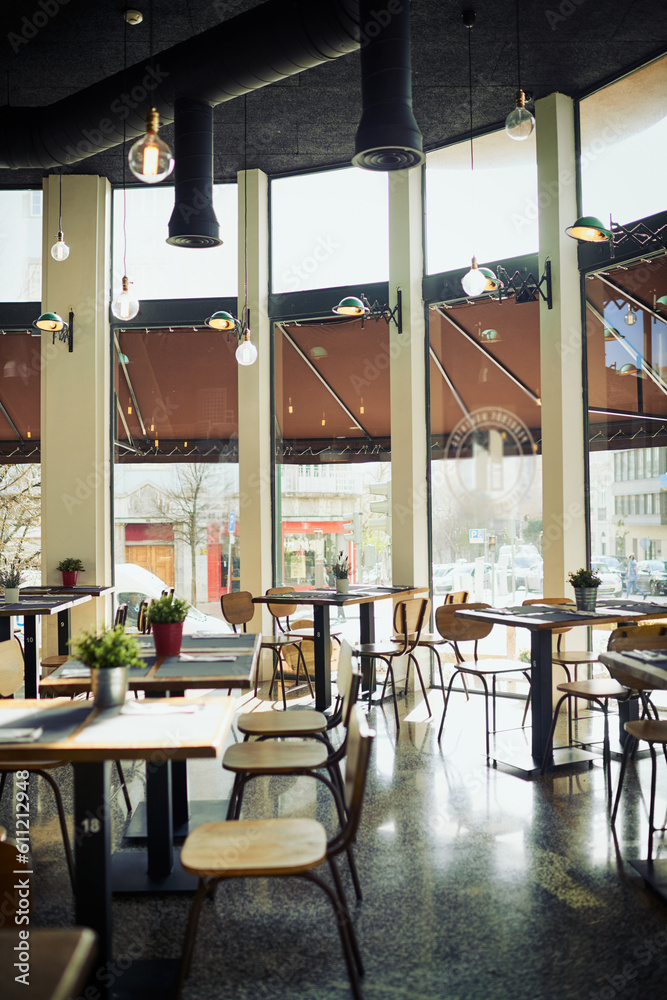 Fototapeta premium Empty restaurant cafe, diner or coffee shop for retail services, hospitality industry or sales service. Interior design decor, bistro store and trendy small business with furniture, chair and table