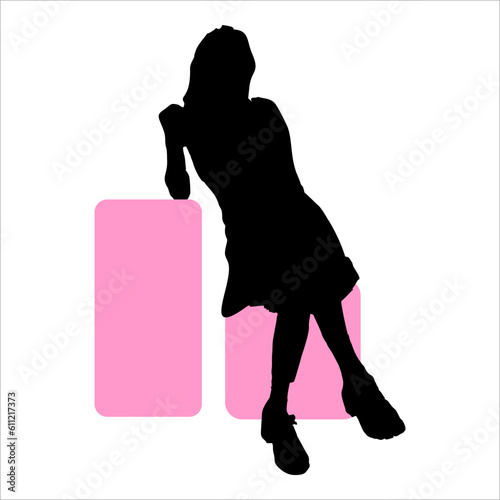 silhouette of a sexy woman sitting stylishly on a pink chair