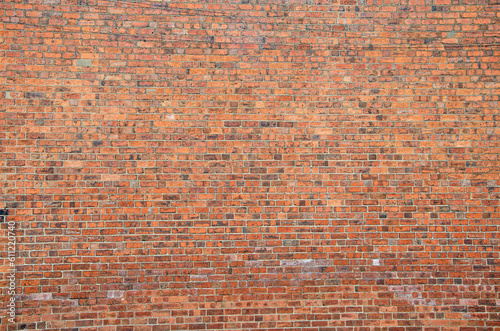 Large red brick wall full frame