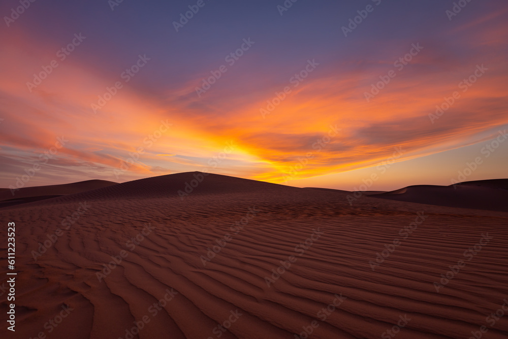 Sunset sunrise with beautiful cloud color in the desert sand dune.