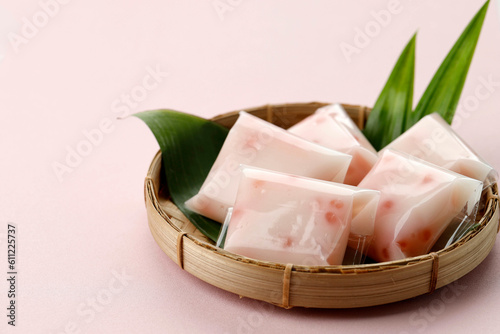 Cantik Manis (Kue Pacar Cina) , Cente is Indonesian traditional dessert made from mung bean flour, sago pearl and coconut milk. Served in bamboo basket