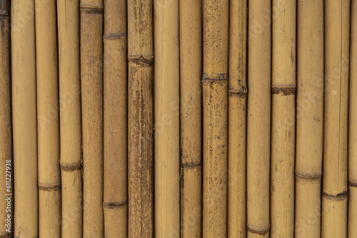 Fototapeta Naklejka Na Ścianę i Meble -  Texture of a vertical bamboo fence. Japanese culture