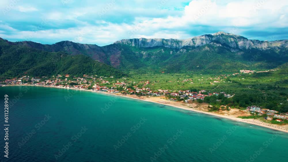 Aerial View Of Golden Beach With Towering Mountain Peaks, Beautiful Beachfront And Lush Vegetation, Vivid Colors, Thassos Island, Greece, Europe Aerial View Of Golden Beach With Towering Mountain Peaks, Beautiful Beachfront And Lush Vegetation, Vivid Colors, Thassos Island, Greece, Europe