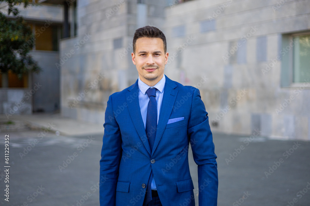 Young business man wearing a modern suit and briefcase out of office. Isolated handsome economist, lawyer, CEO, entrepreneur, executive director and businessman looking at camera. Copy space. Young business man wearing a modern suit and briefcase out of office. Isolated handsome economist, lawyer, CEO, entrepreneur, executive director and businessman looking at camera. Copy space.