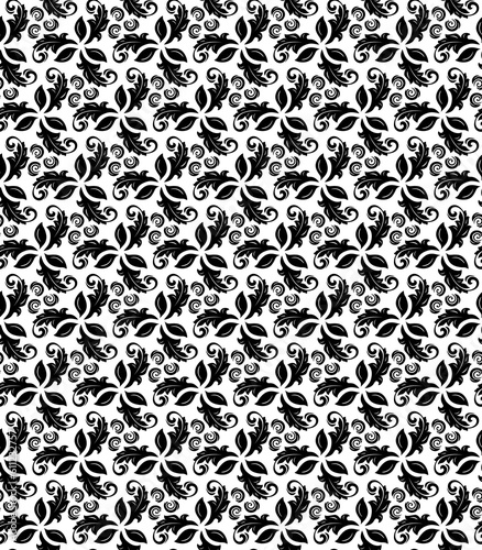 Black and white ornament. Seamless abstract classic background with leaves. Pattern with repeating floral elements. Ornament for fabric, wallpaper and packaging