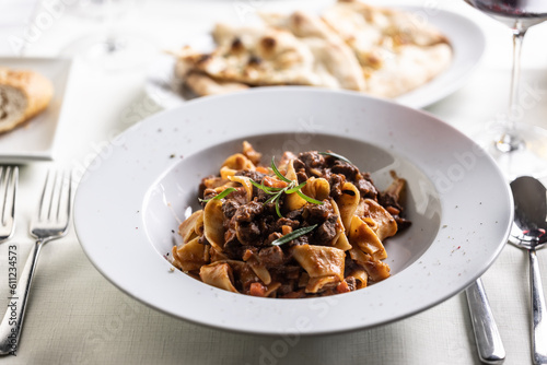 Papardelle al cinghiale, a Sienese typical dish with game ragout in a plate