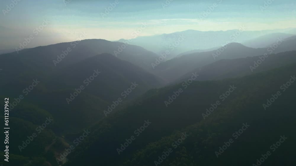 Turquoise water in a mountain forest lake with pine trees. Aerial view of green lake and green forests. View on the lake between mountain forest. Over crystal clear mountain lake water. Fresh water Turquoise water in a mountain forest lake with pine trees. Aerial view of green lake and green forests. View on the lake between mountain forest. Over crystal clear mountain lake water. Fresh water