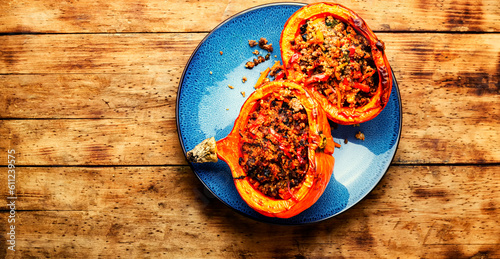 Roasted pumpkin with minced meat and quinoa,space for text
