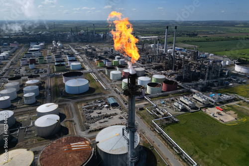 Industrial oil refinery flare stack, Immingham petroleum production plant photo