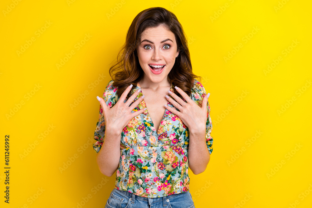Photo of impressed funny lady wear retro flower print blouse smiling arms chest isolated yellow color background Photo of impressed funny lady wear retro flower print blouse smiling arms chest isolated yellow color background