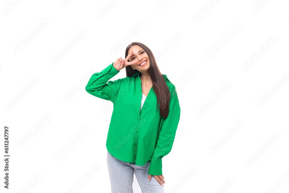 well-groomed sexy slim european brunette woman with long hair dressed in casual green shirt flirting well-groomed sexy slim european brunette woman with long hair dressed in casual green shirt flirting