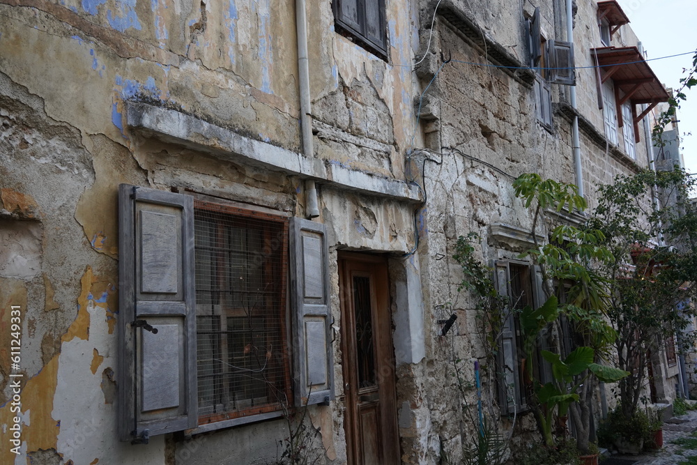 Medieval narrow streets and old ruined houses in old Rhodes town, Greece