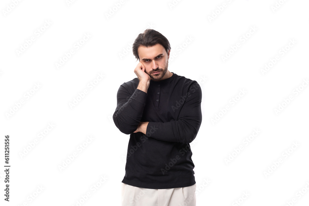 close-up of a young well-groomed brunette man with a haircut and a beard dressed in a black jacket isolated on a white background with copy space close-up of a young well-groomed brunette man with a haircut and a beard dressed in a black jacket isolated on a white background with copy space