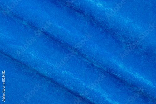 blue velvet fabric texture used as background. blue fabric background of soft and smooth textile material. There is space for text..