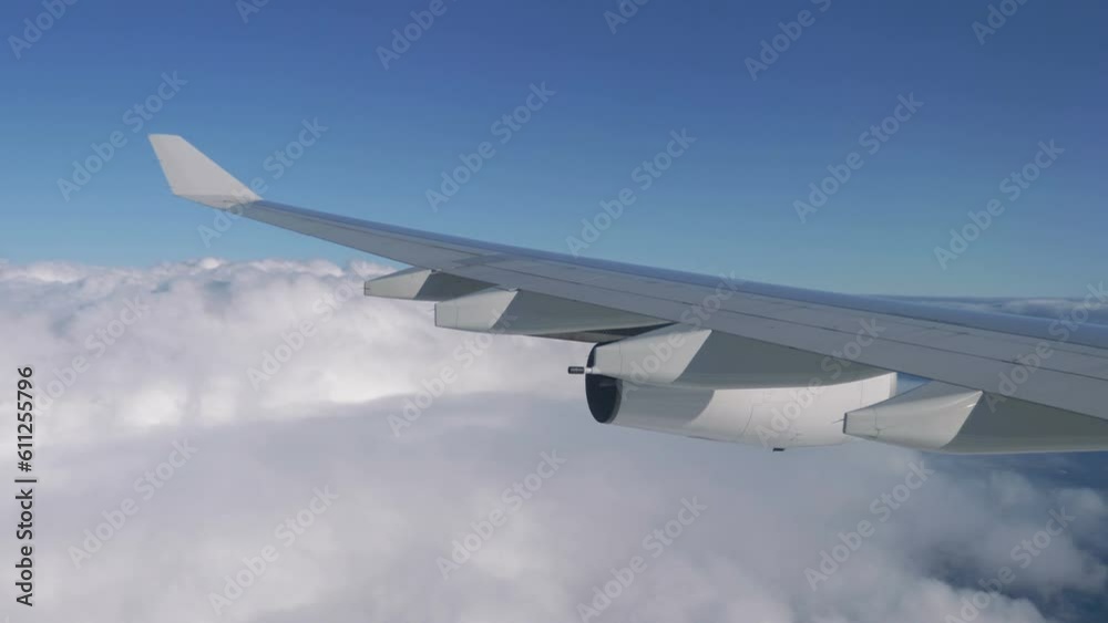 Airplane flight above the clouds in 4K slow motion 60fps Airplane flight above the clouds in 4K slow motion 60fps