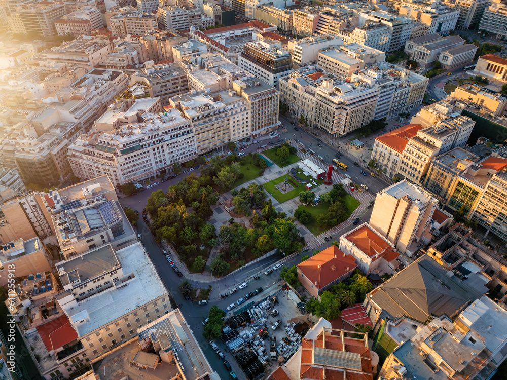Fototapeta premium Aerial view of the Athens, Greece, skyline with the popular Klafthmonos Square in soft summer sunset light