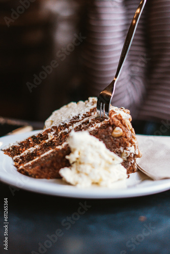 Portrait shot of carrot cake with two forks in Salamanca Markets, Tasmania, Australia
