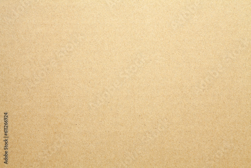 Close-up of brown cardboard texture background